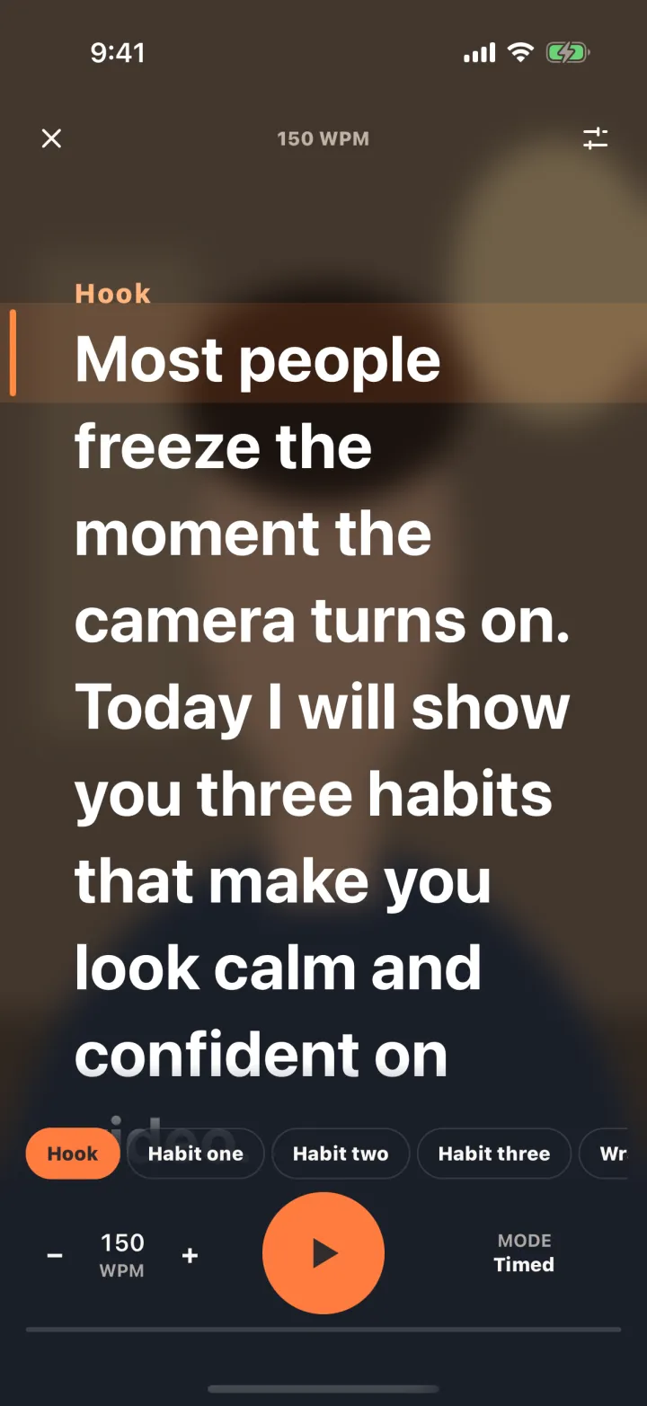 Talkzy screenshot: the script in a narrow column right under the front camera, with the line being read on an orange reading band near the top